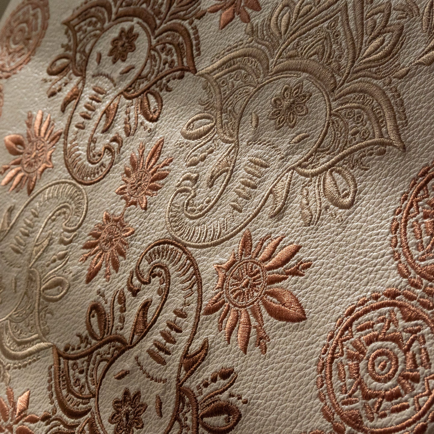 Zojirushi logo ♾ Dark and light brown textured stitching